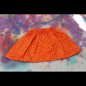 Orange polka dot skirt